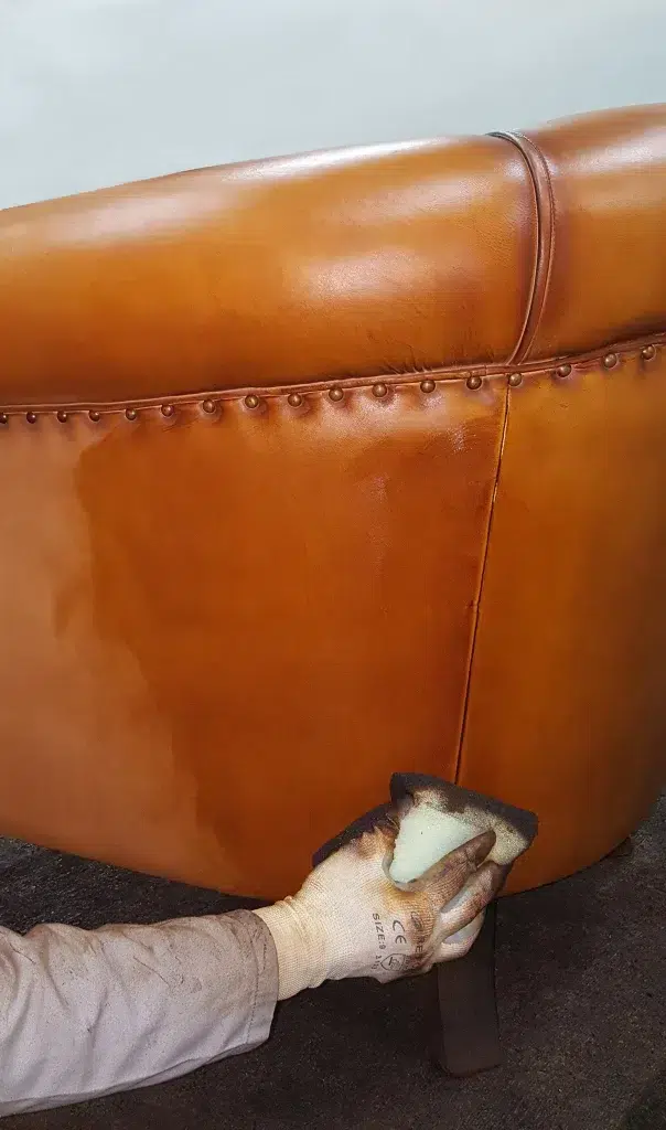 Step of the manufacturing process of a club chair, the polish