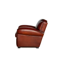 Fauteuil club cuir Petit Moustache cognac, vue de côté